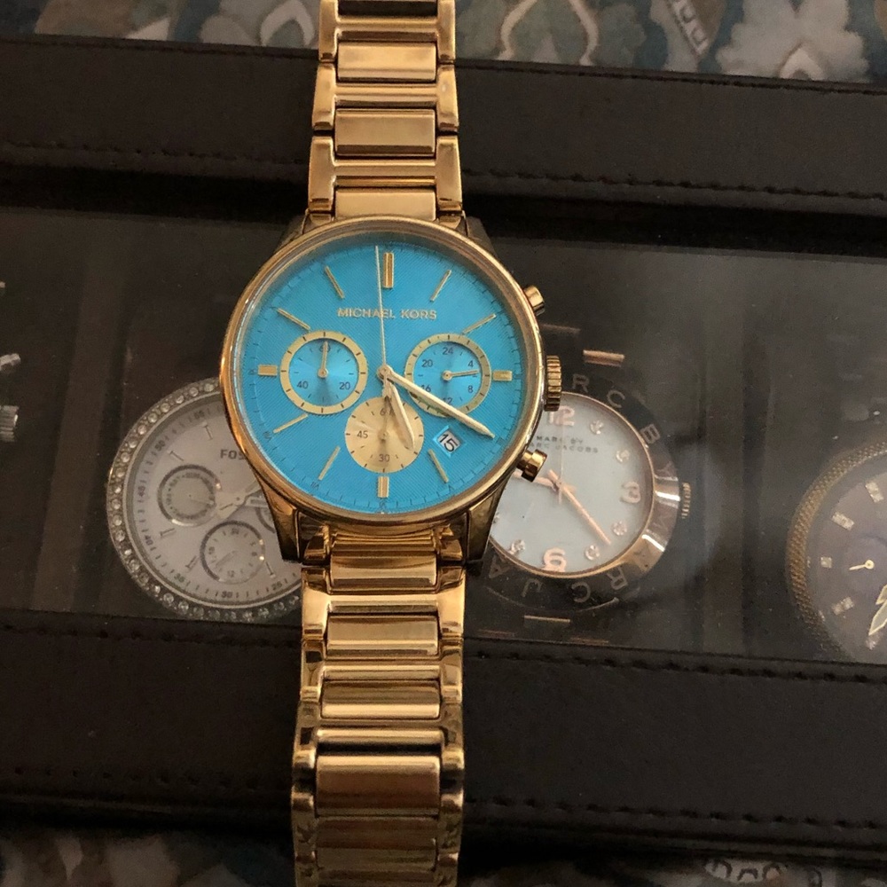 Gold (with teal face) Michael Kors watch